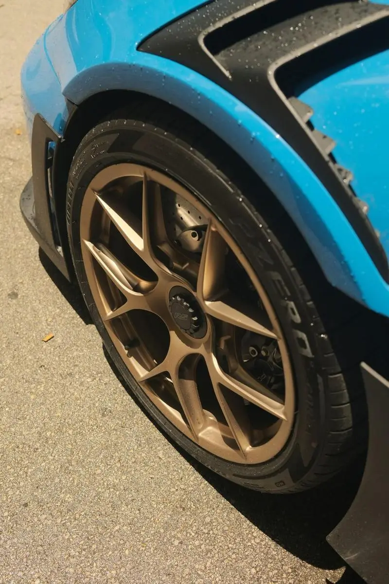 Alloy wheel being refurbished by a mobile technician