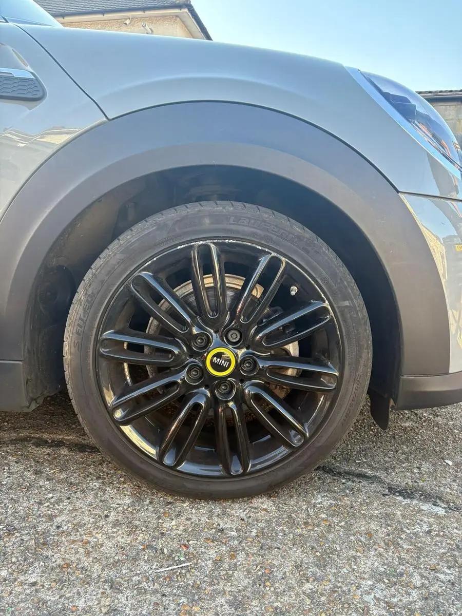 Mini Cooper alloy wheel with scuffed and corroded rim before refurbishment